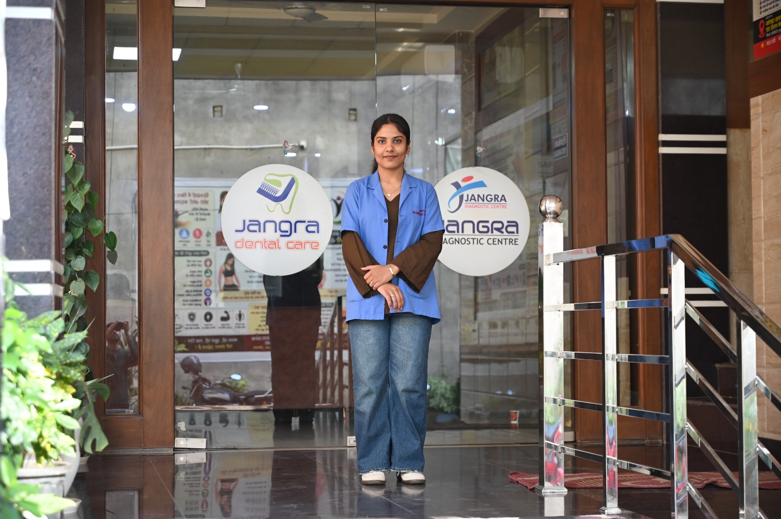 Clinical nursing staff member at the entrance of Jangra Diagnostic Centre